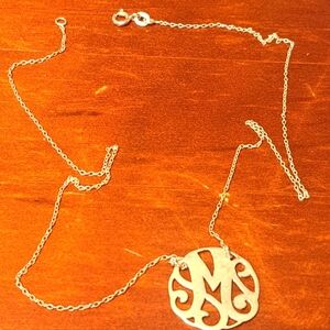 Monogram letter M Teklaestelle Neck